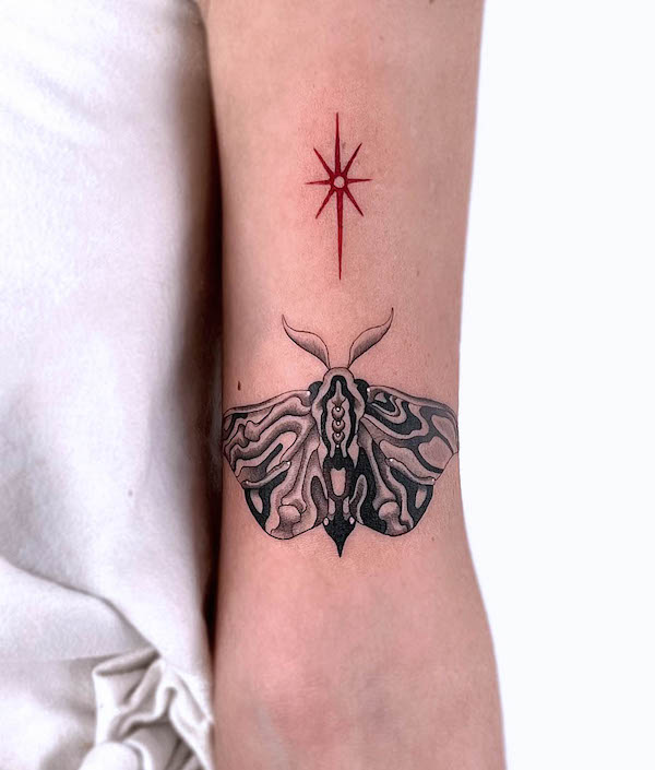 Star and patterned moth tattoo by @nxe_xiner