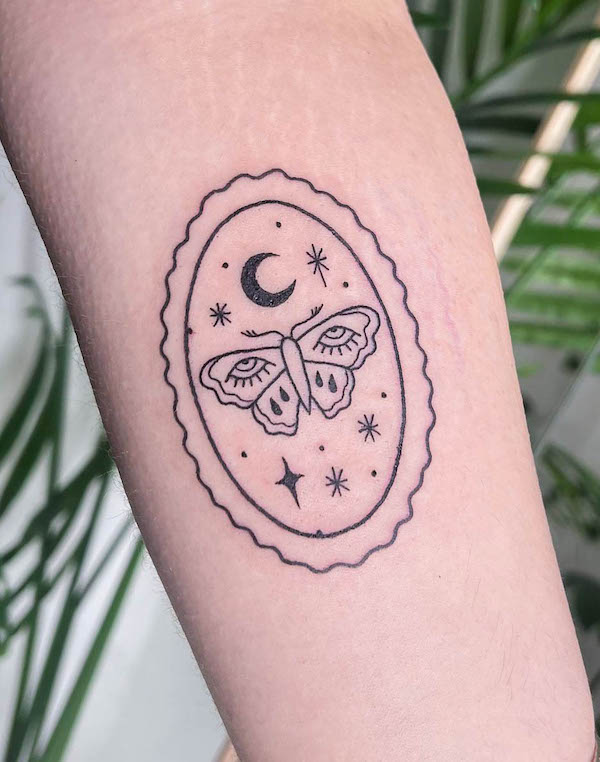 Simple moth in a mirror tattoo by @jadehazetattoo