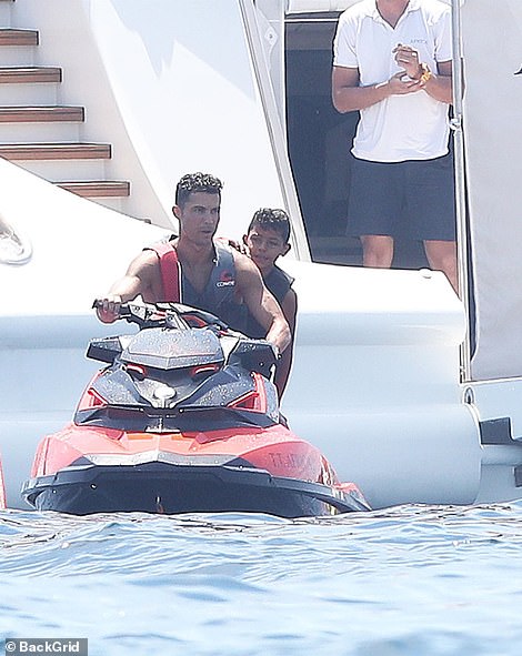 Fun-filled trip! He also posted snaps of the yacht's incredible inflatable side, which began on the top deck of the vessel and finished in the sea - no doubt providing endless hours of fun for Cristiano's young brood