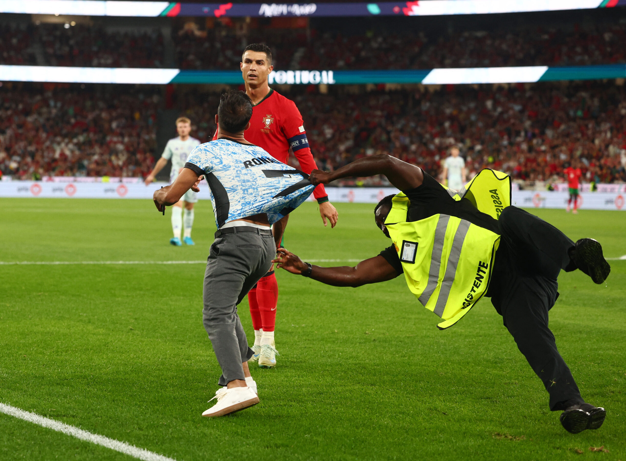 A pitch invader tried to reach Cristiano Ronaldo