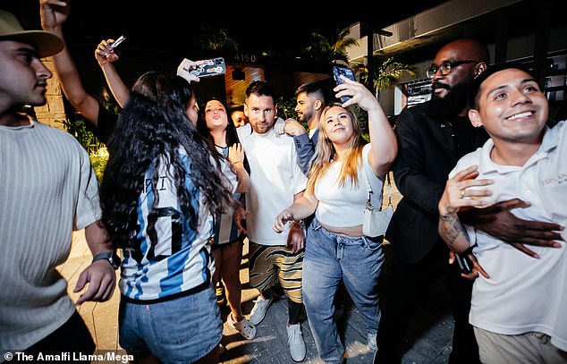 Several fans wearing Argentina shirts bearing Messi's name took photos with the star