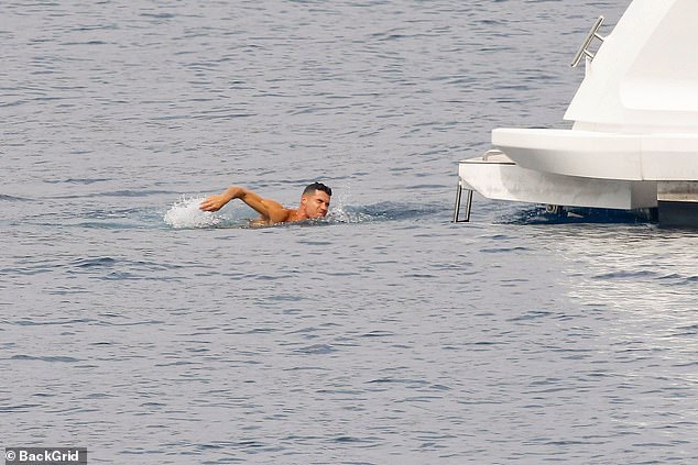 The footballer looked thoroughly relaxed on his trip